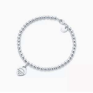 Return to Tiffany- Tiffany Blue Heart Tag Bead Bracelet in silver
